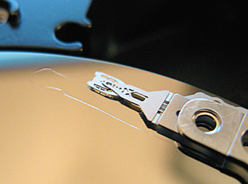 A scratched hard drive platter